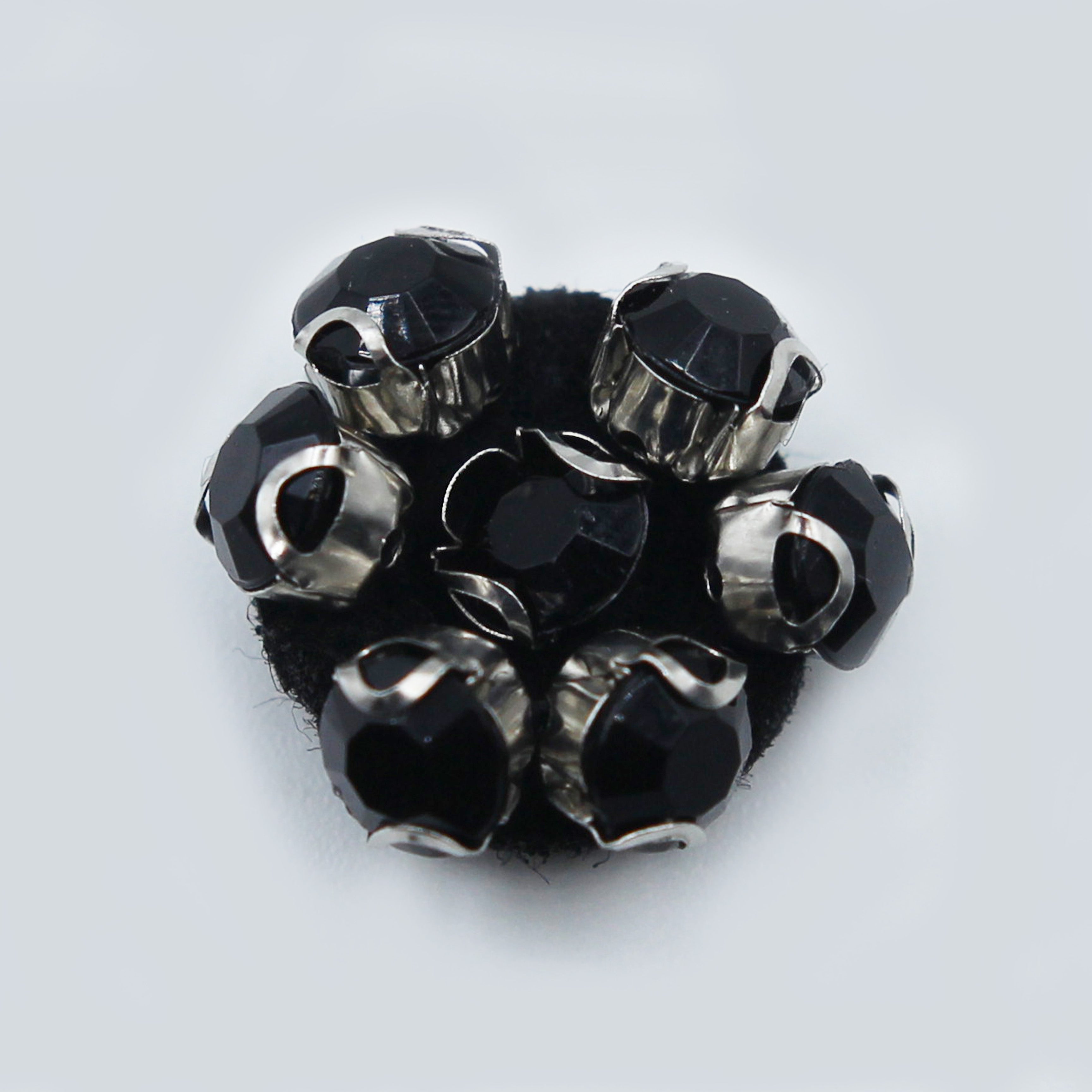 APLIQUE MANUAL FLOR PIEDRAS NEGRA