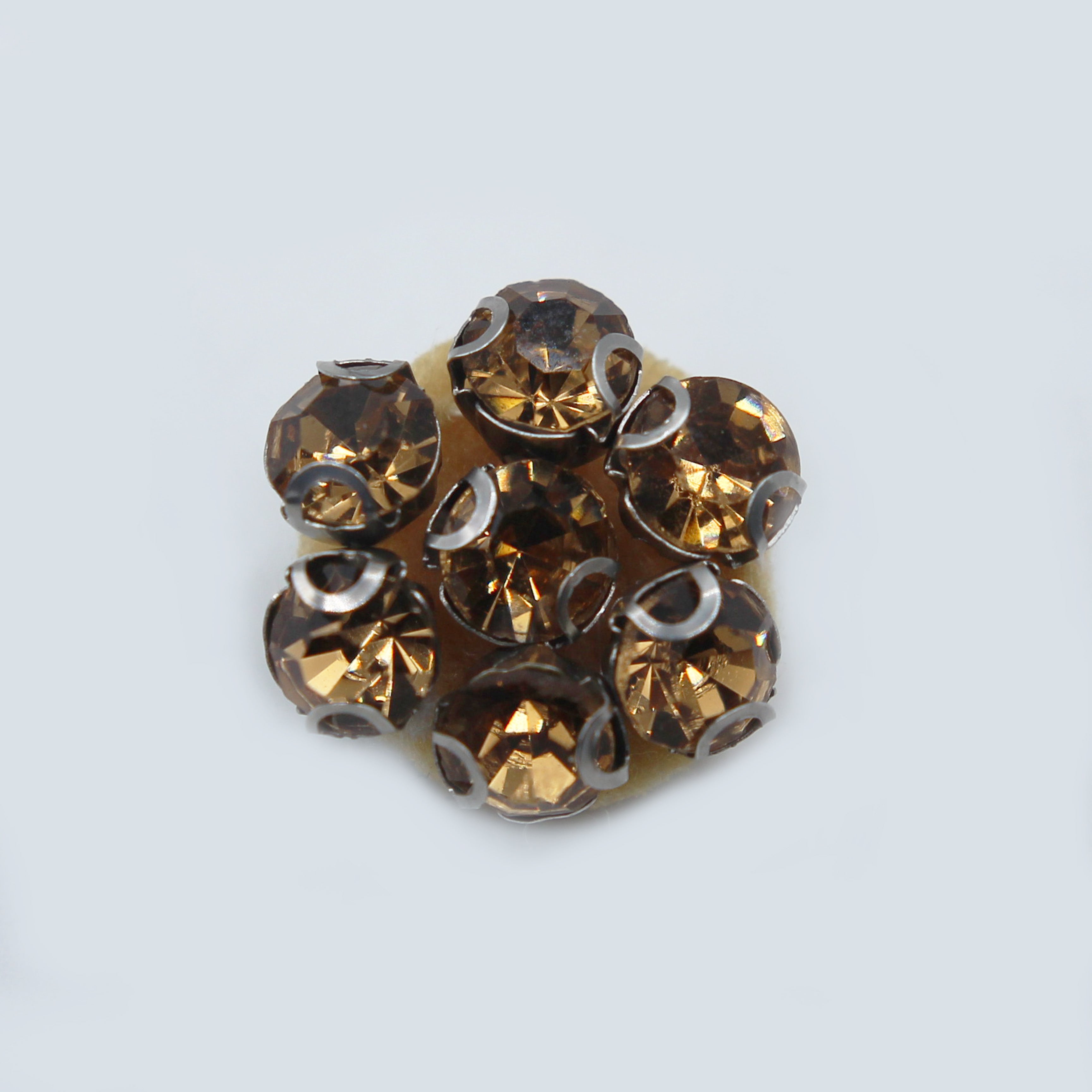 APLIQUE MANUAL FLOR PIEDRAS OCRE